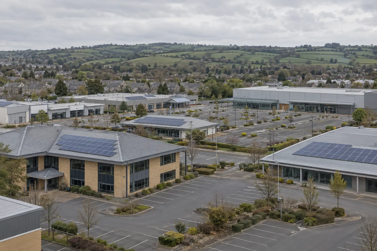 The commercial edge of a South West market town, with rooftop solar on several buildings